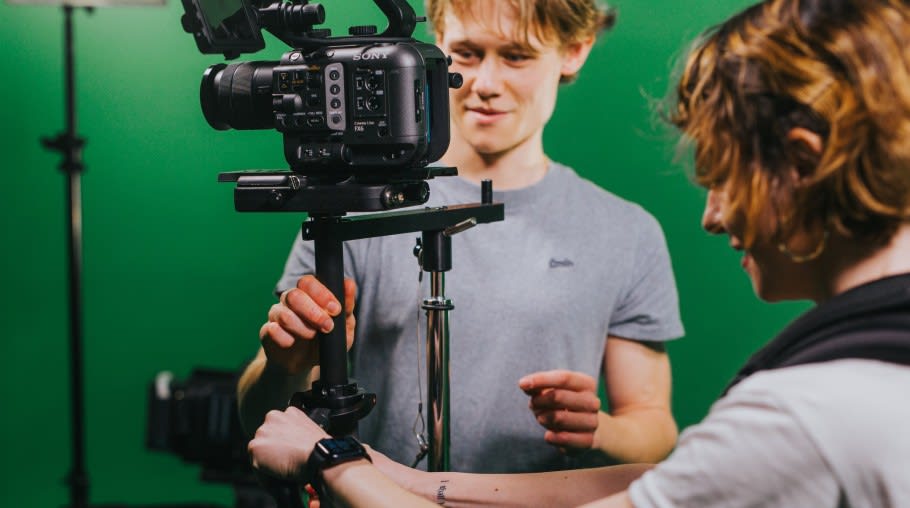 Image of students using recording equipment