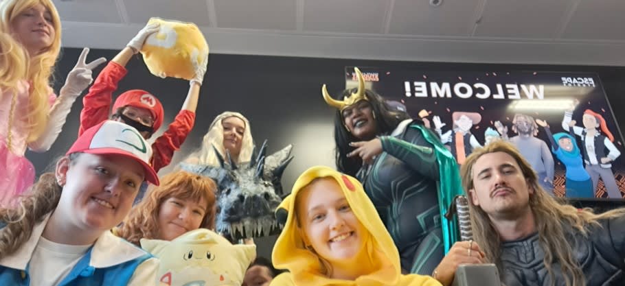 Image of a studio and a group of people with actors