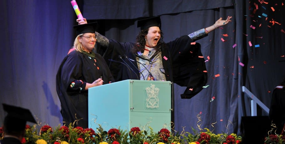 Image of a student on graduation stage