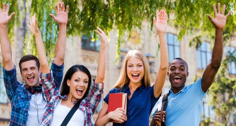 students at a UCAS fair on a sunny day