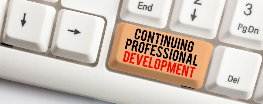 Image of a keyboard with the text continuing professional development added
