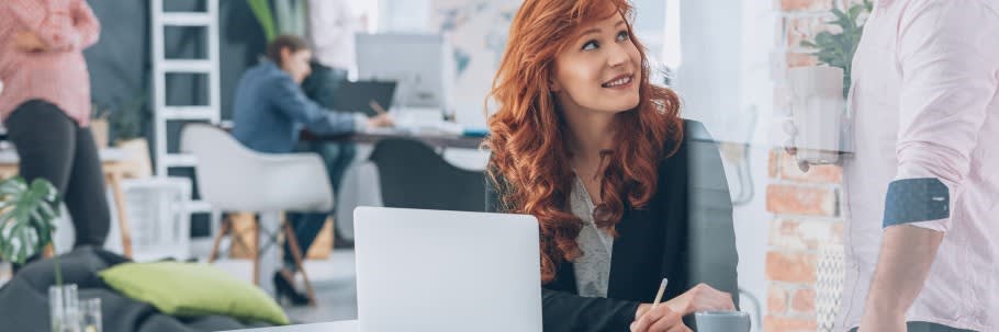 Image of a teacher having a conversation with a university practitioner