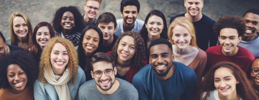 An image of a diverse range of students attending a university event An image of a diverse range of students attending a university event