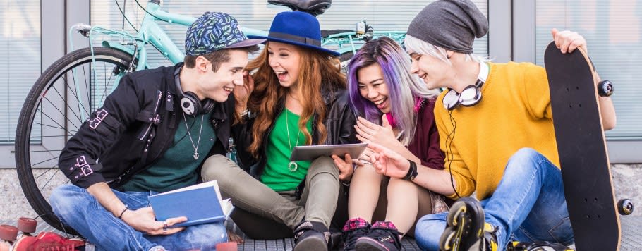 A group of students socialising at university A group of students socialising at university