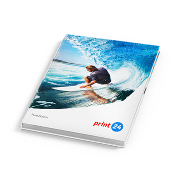Surf photo book cover from print24.com depicts surfers in blue ocean wave, dynamic and vibrant.
