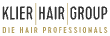 Klier Hair Group-logo med svart tekst "The Hair Professionals" på gul bakgrunn, som representerer en profesjonell leverandør av hårstyling og frisørtjenester.