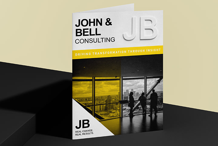 Premium folding card with black-and-white finish and yellow accents – modern automotive and future-themed design for exclusive print communication