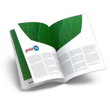 Brochure ouverte pliée en éventail avec reliure agrafée, présentant un motif de feuille verte.