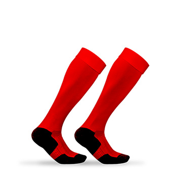 A pair of bright red sports socks with a black sole, knee-length and padded, ideal for sporting activities.