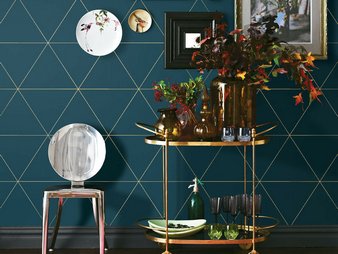 This dark teal wallpaper is distinguished and modern. Metallic gold lines create a triangular pattern. picture 1