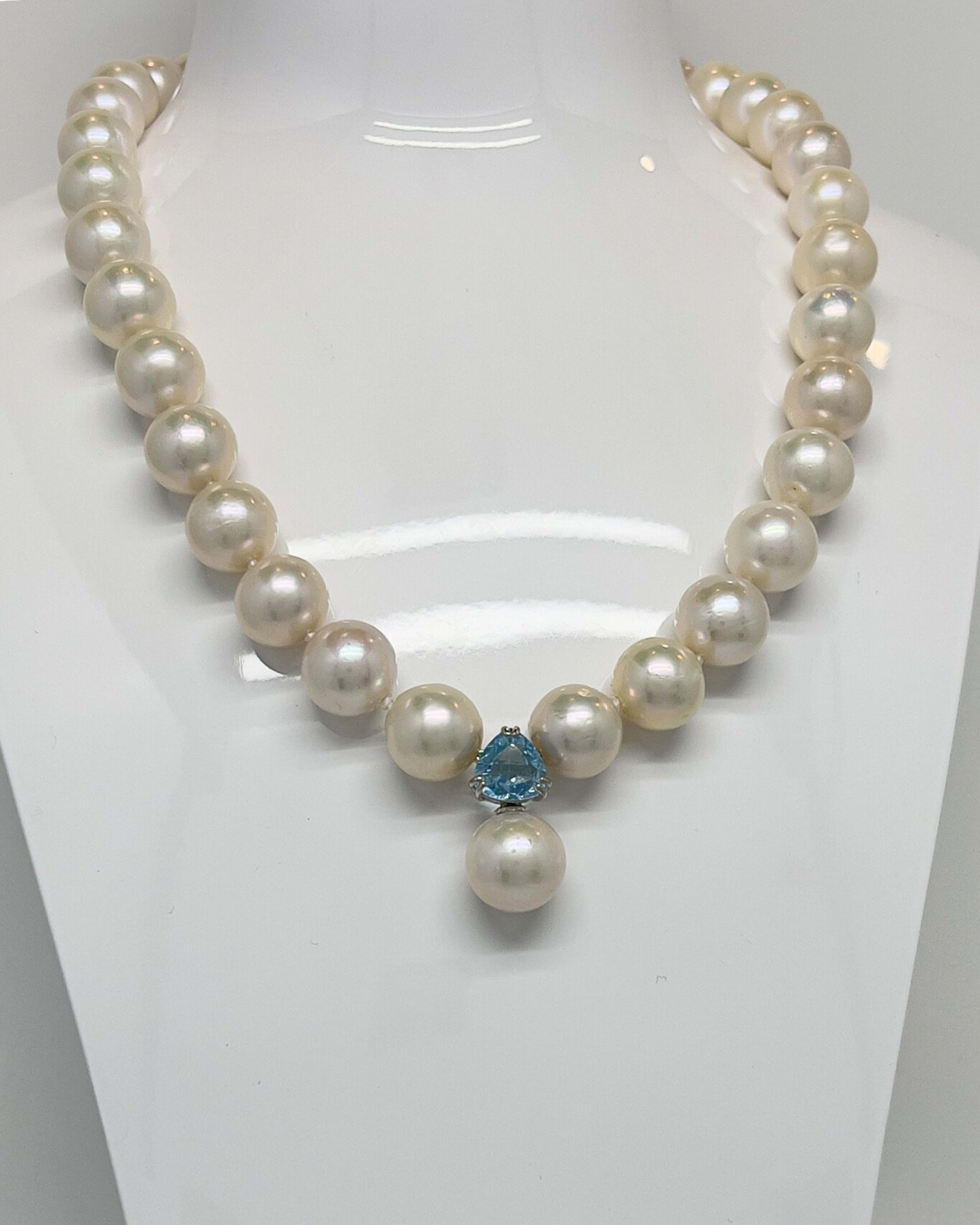 Classic round pearl pendant necklace with topaz accents in rhodium-plated sterling silver