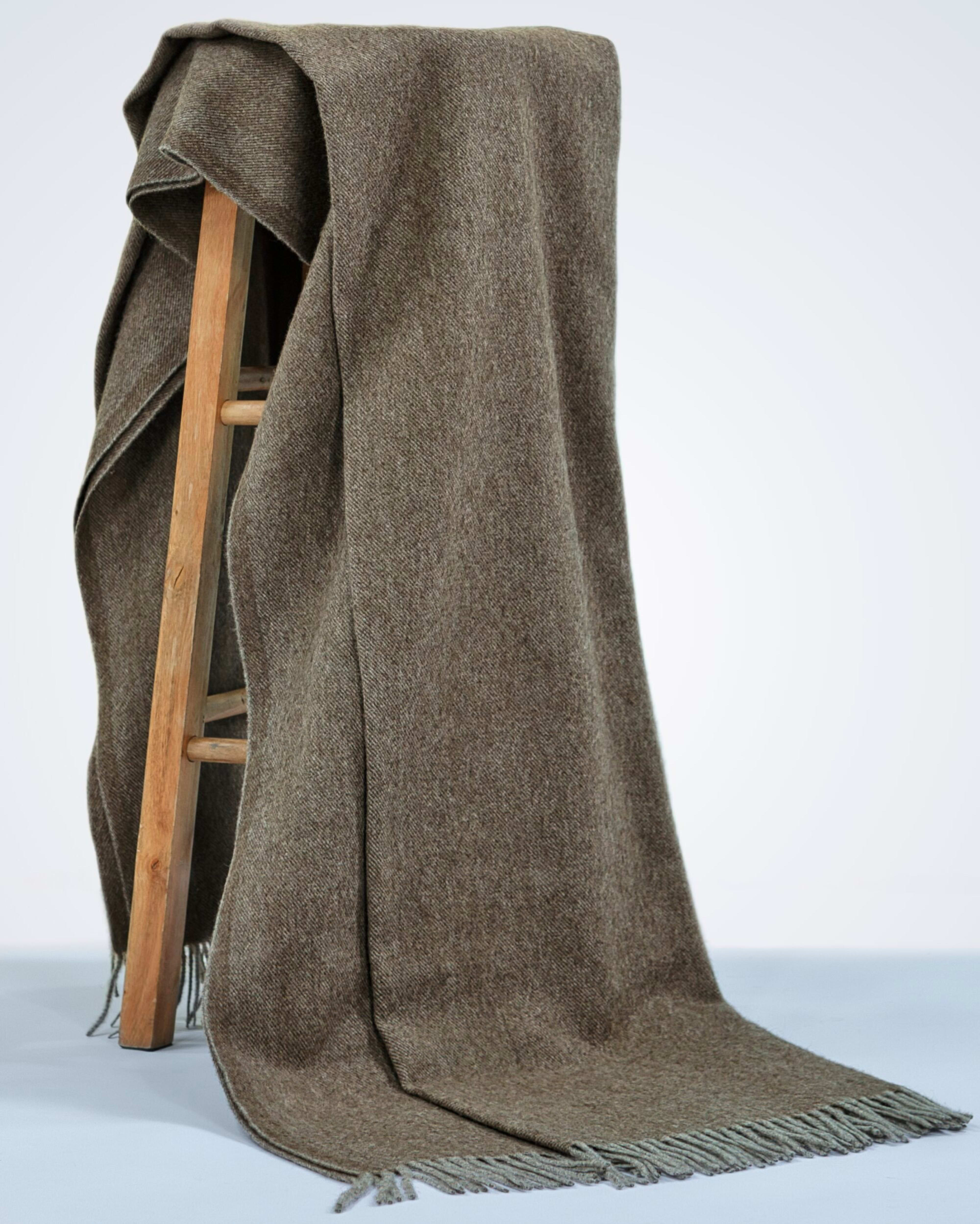natural brown yak wool blanket draped over a chair