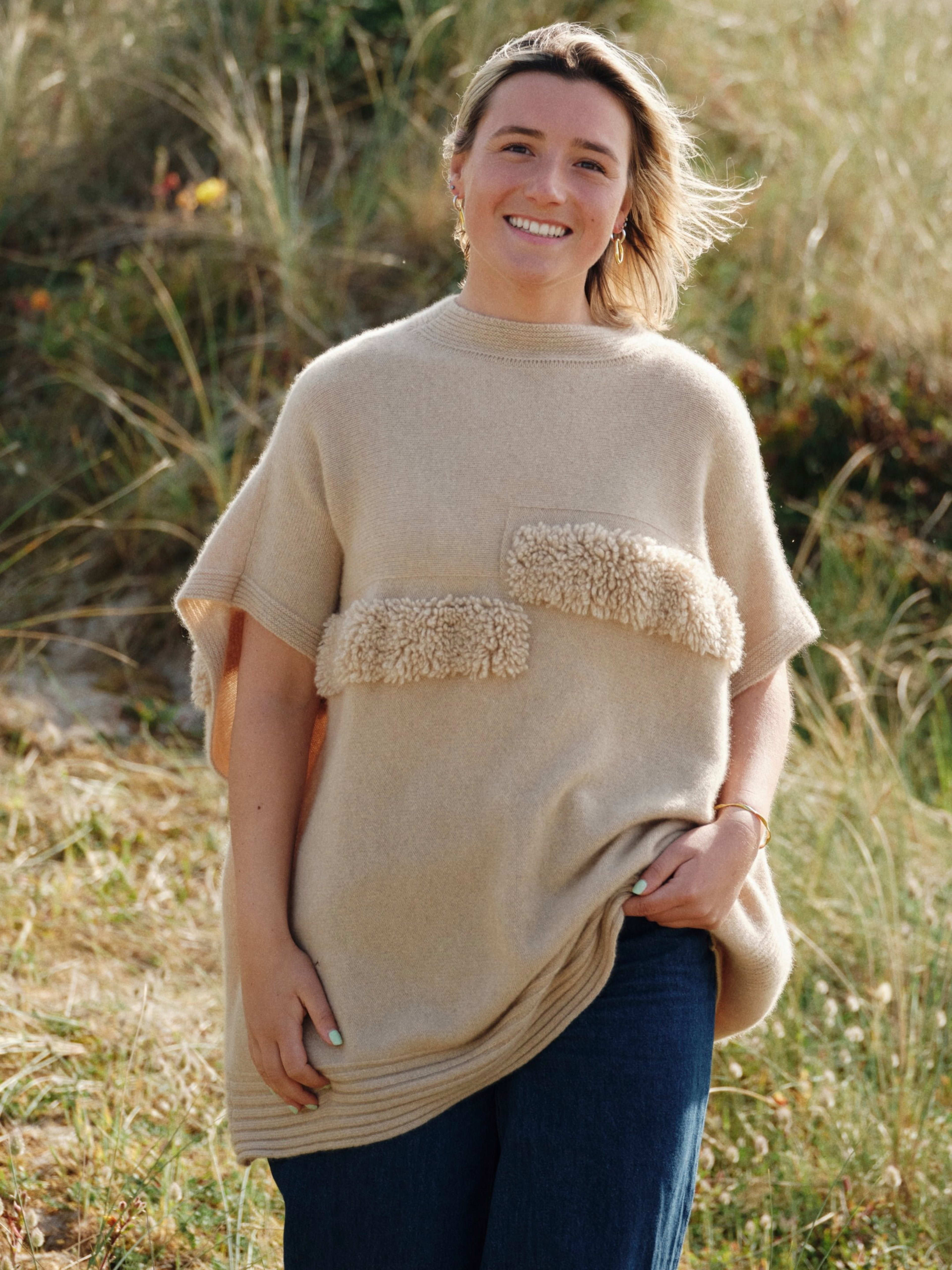 Women's natural beige cashmere ribbed poncho on model