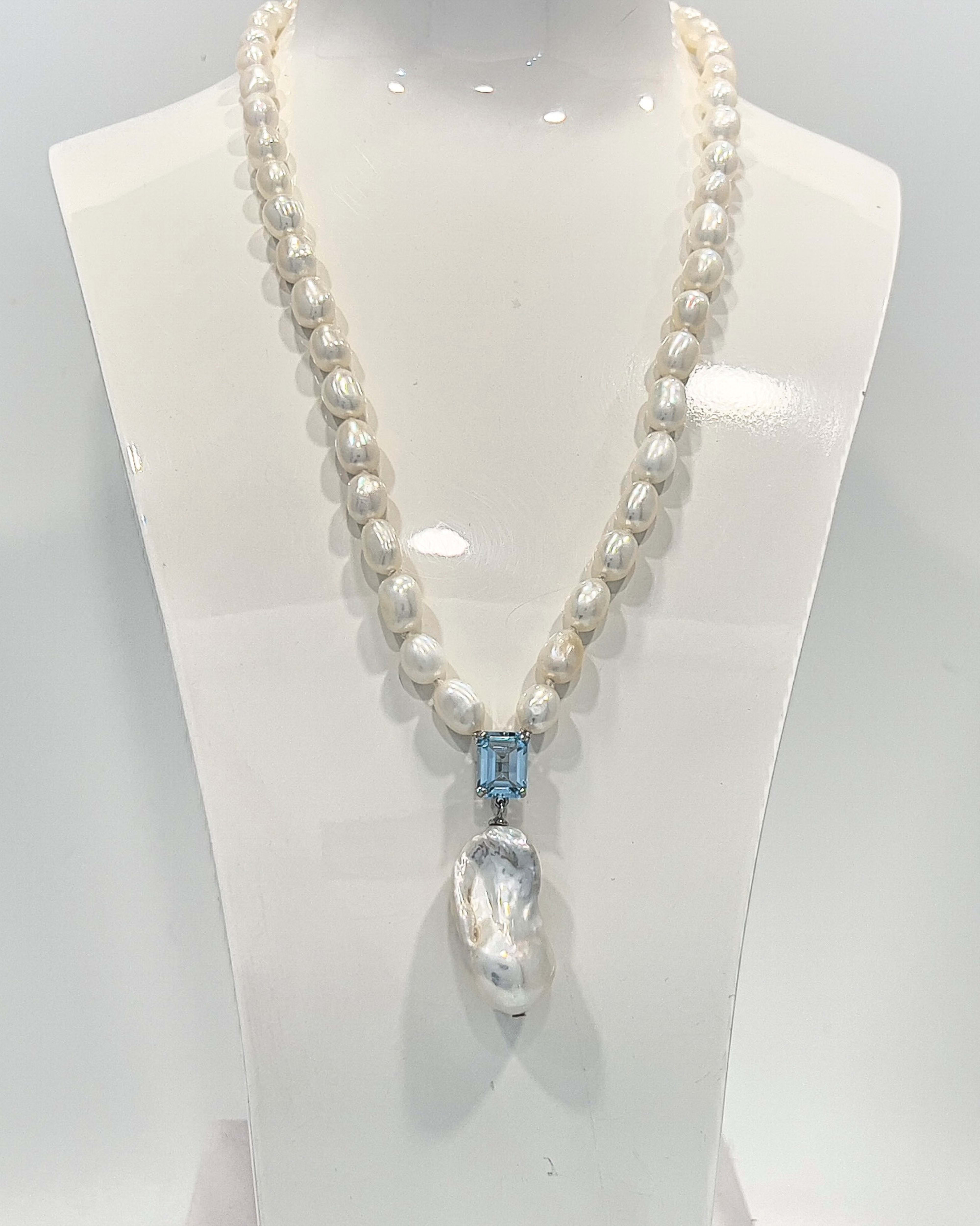 Signature baroque pearl pendant necklace with a square-cut topaz and delicate chain of smaller baroque pearls