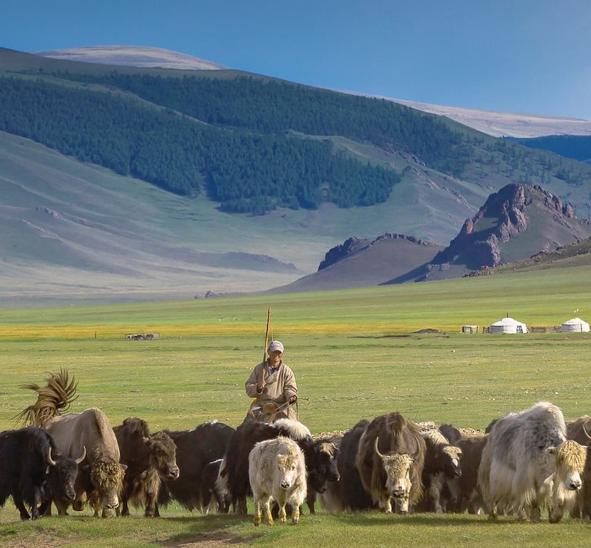 Ugii and Jackie with nomadic herder in Mongolia
