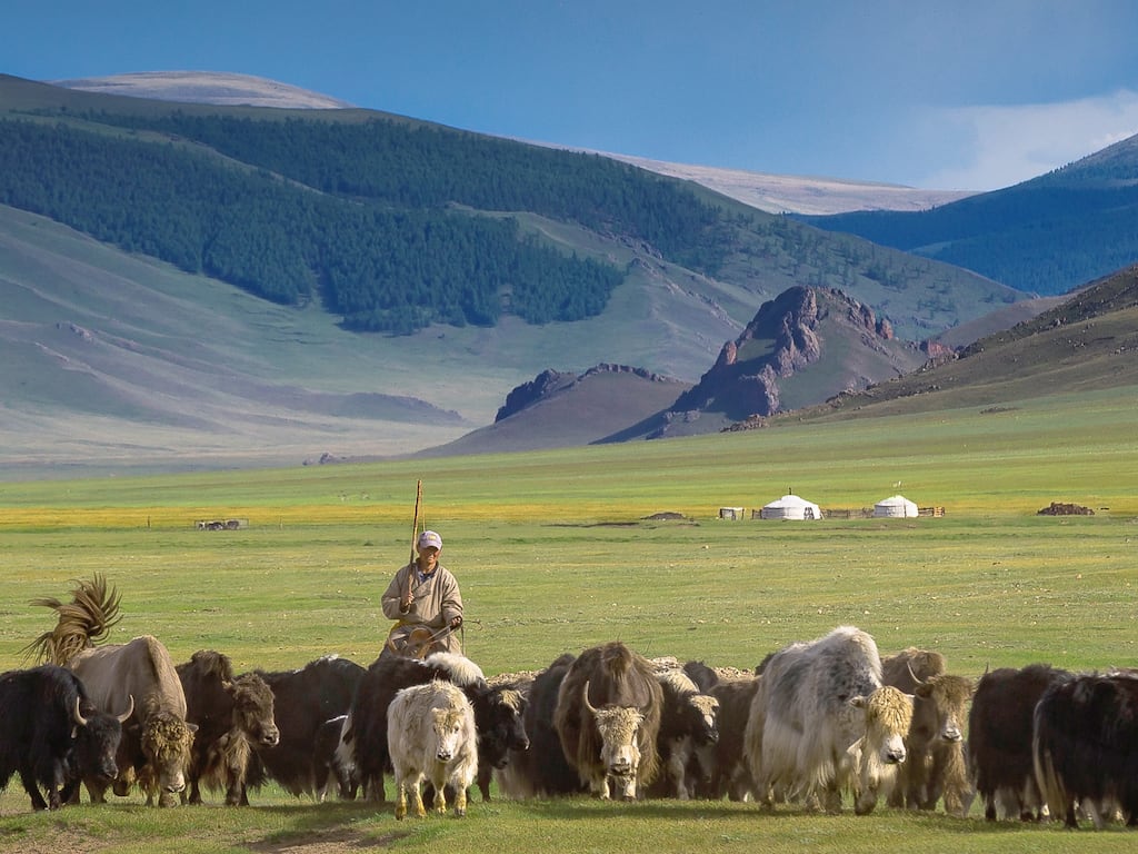 Ugii and Jackie with nomadic herder in Mongolia