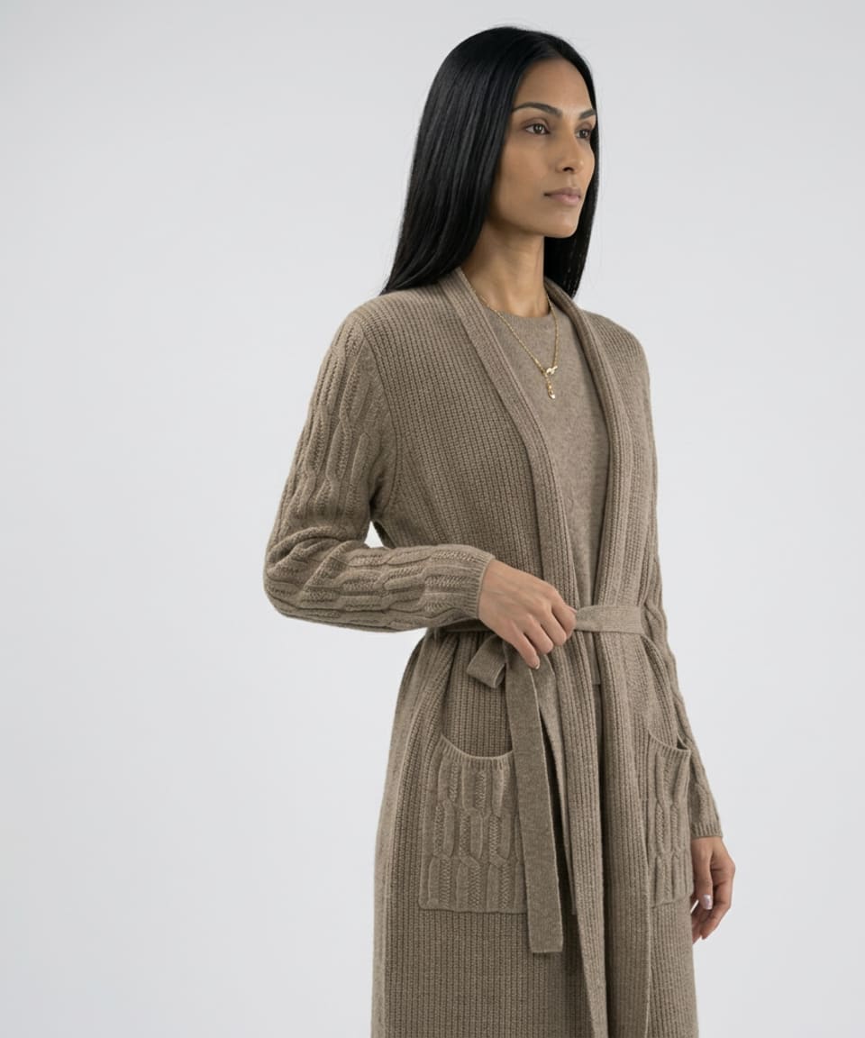 Front view of model wearing soft cashmere ribbed cardigan in natural brown