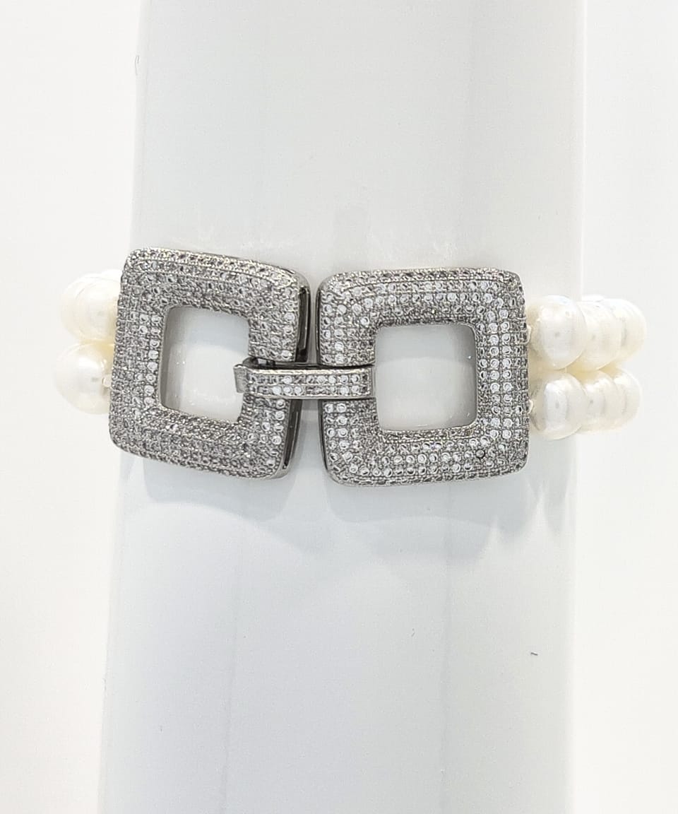 Classic round pearl bracelet with double white strand and square crystal clasp