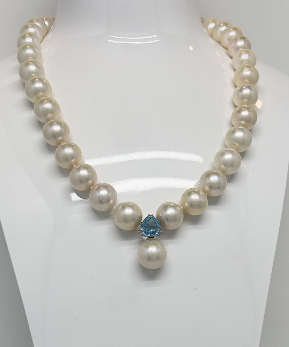Classic round pearl pendant necklace with topaz accents in rhodium-plated sterling silver