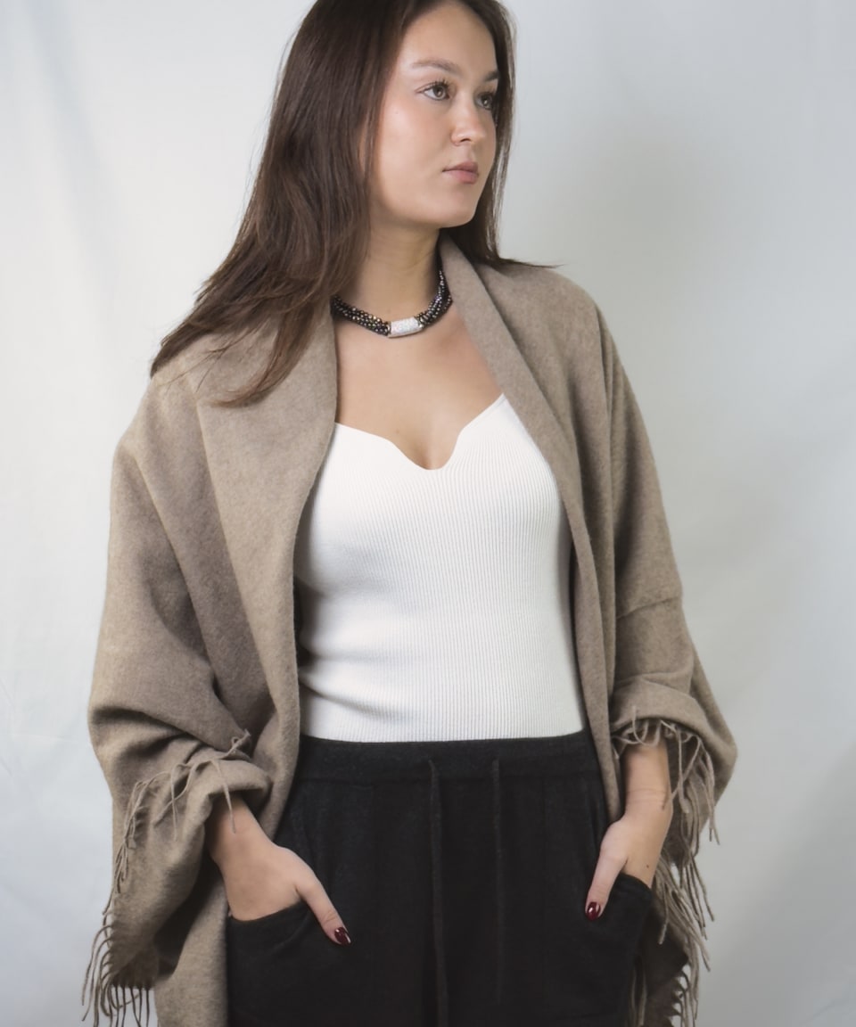 woman wearing a natural brown cashmere shawl
