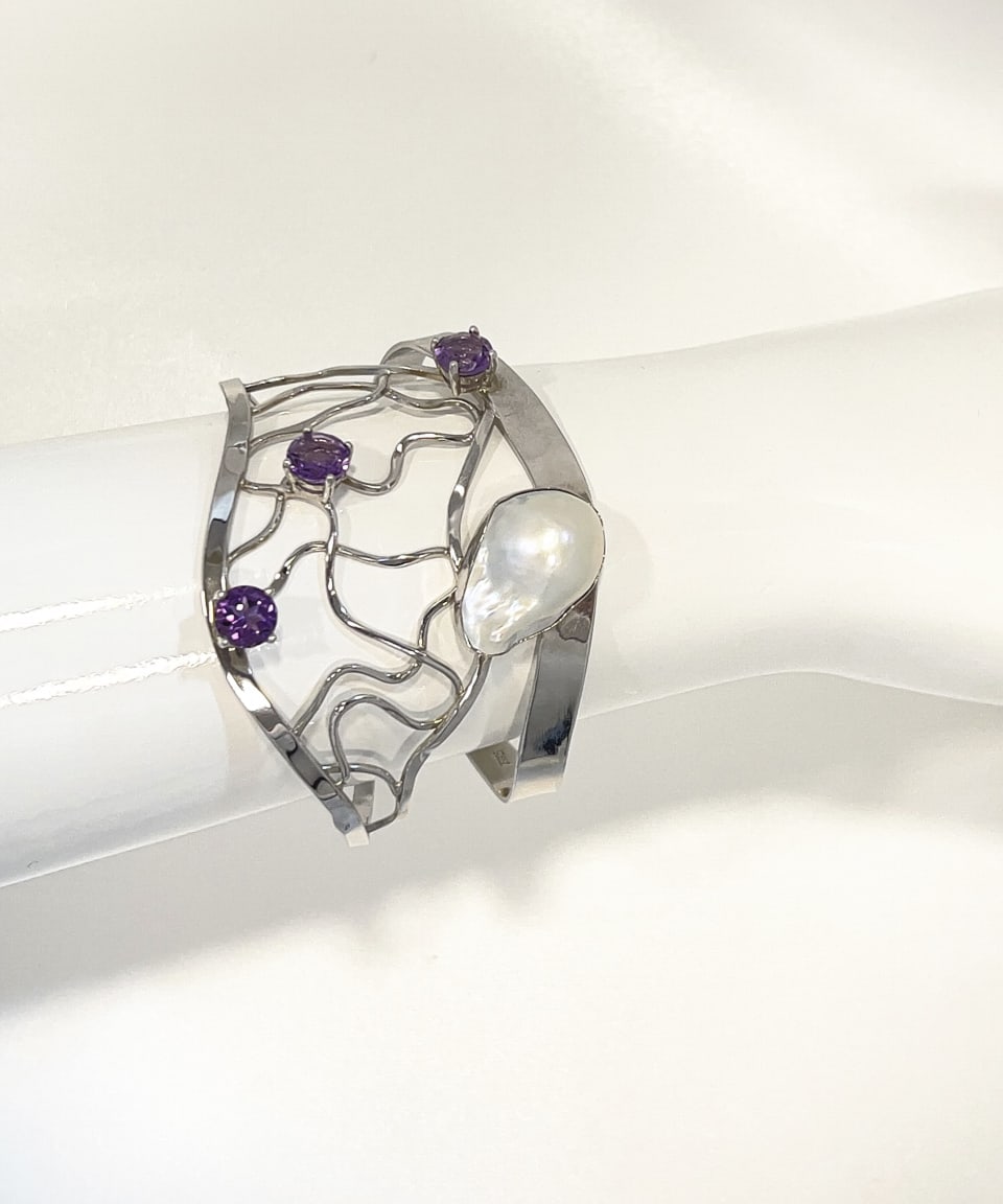 Elegant rhodium-plated sterling silver lattice bangle with a baroque pearl and three amethysts