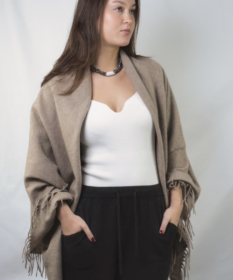 woman wearing a natural brown cashmere shawl