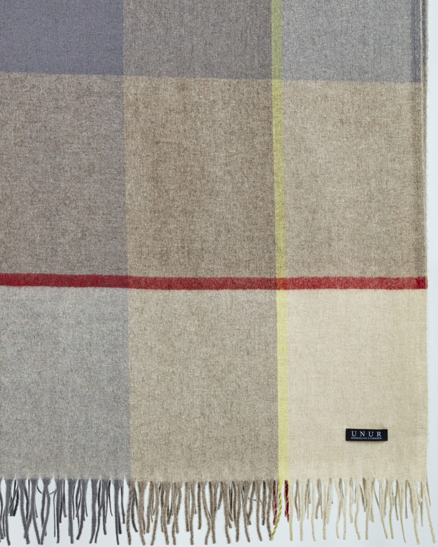 close-up detail of a check plaid cashmere blanket