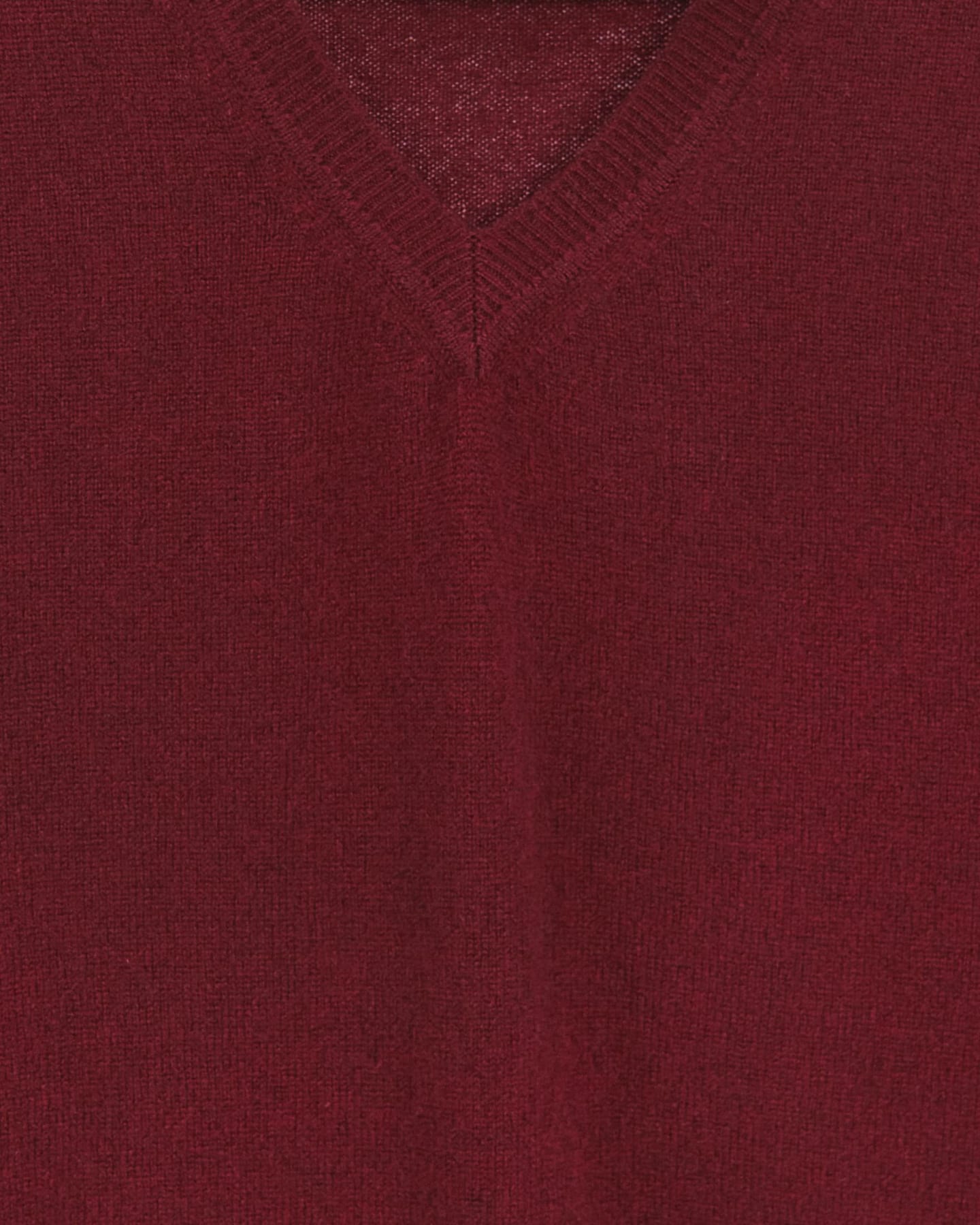 Close-up of soft cashmere jumper in red