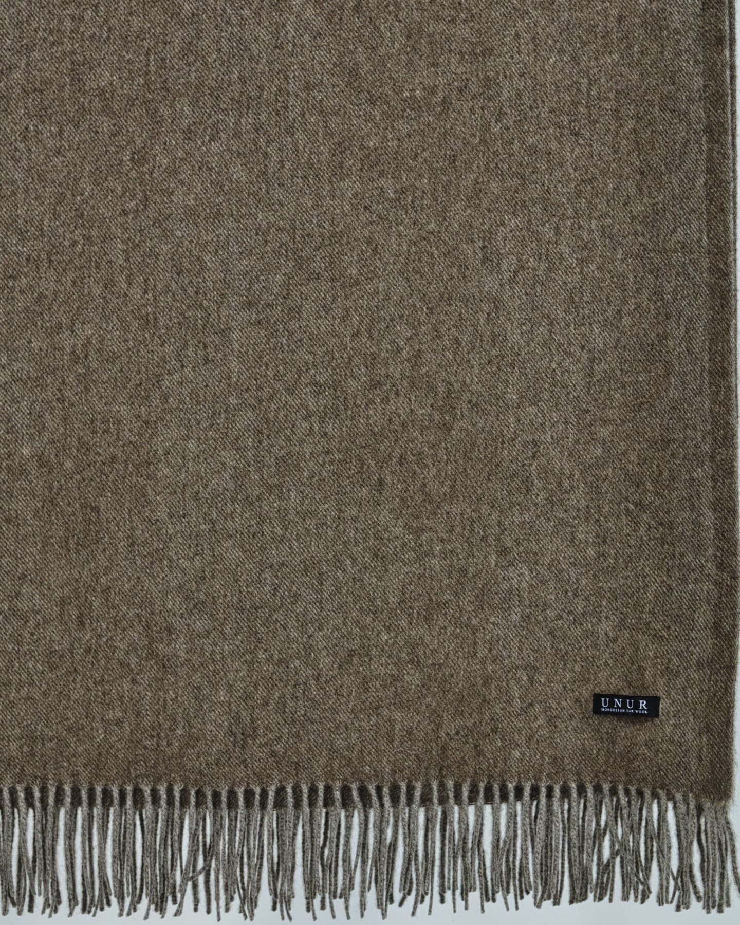 close up detail of a natural brown yak wool blanket