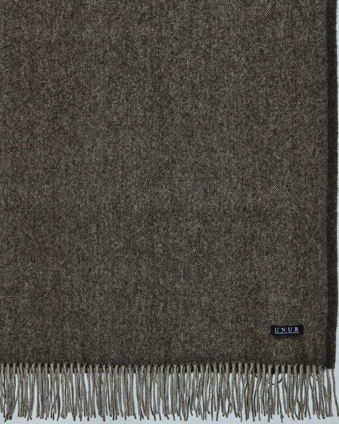 close up detail of a natural dark brown yak wool blanket