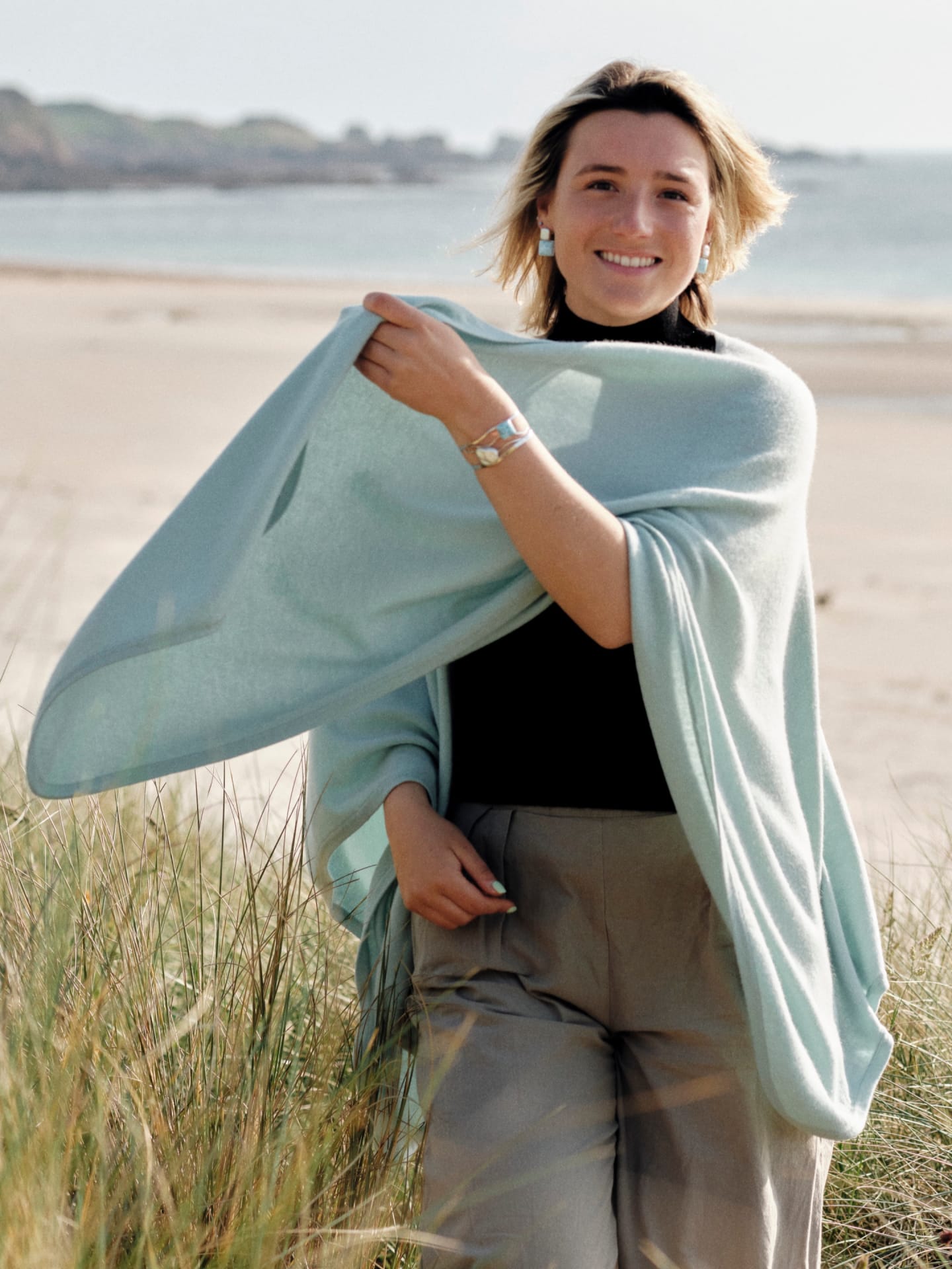 Women's mint green cashmere cape on model