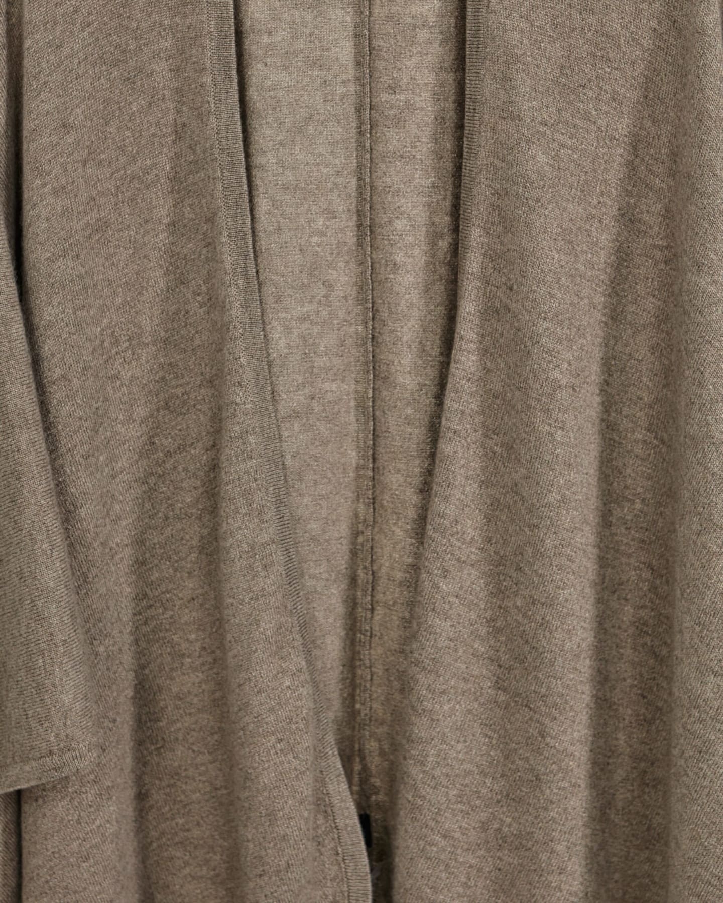 Close-up of soft cashmere cape in natural brown