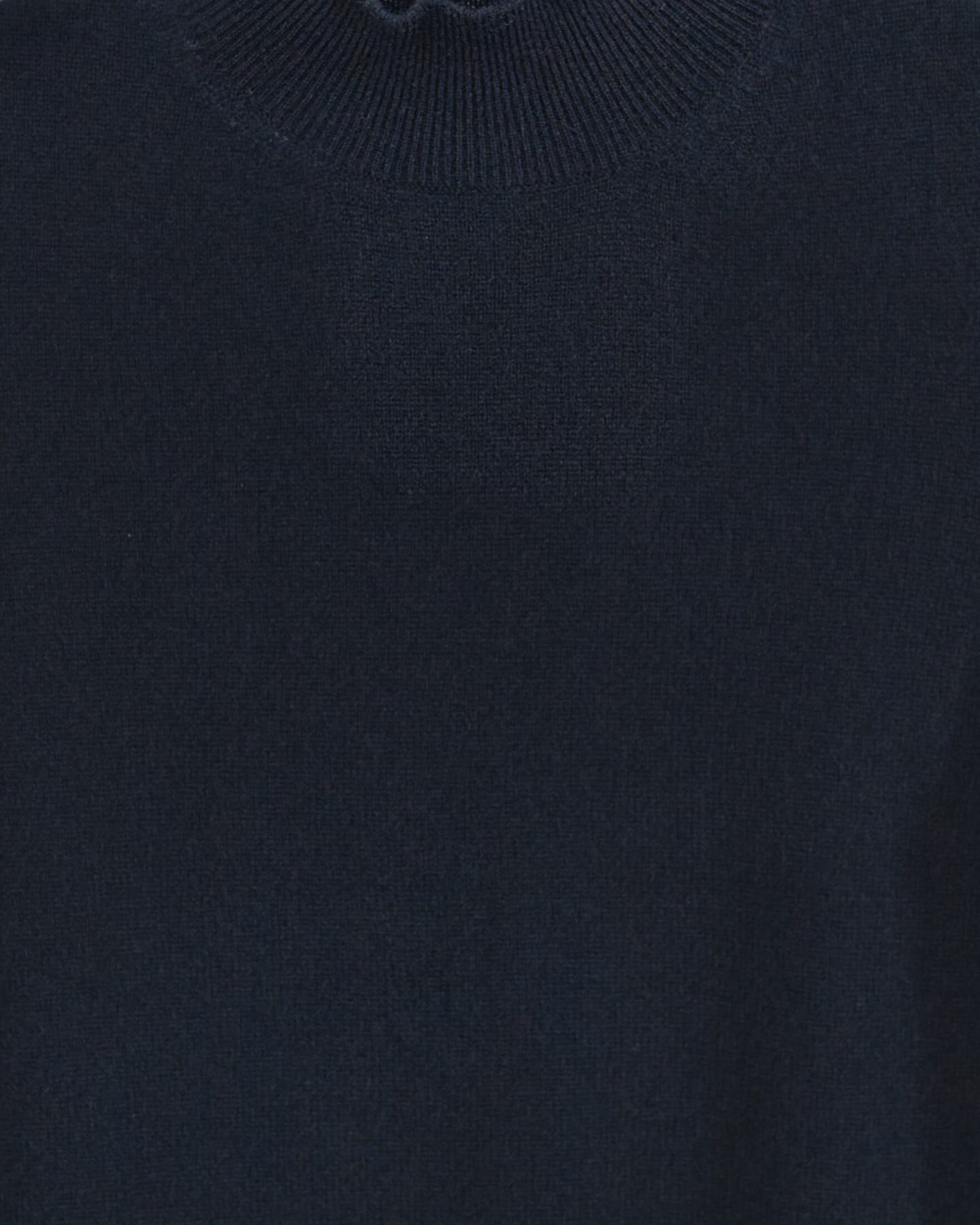 Close-up of soft cashmere t-shirt in black