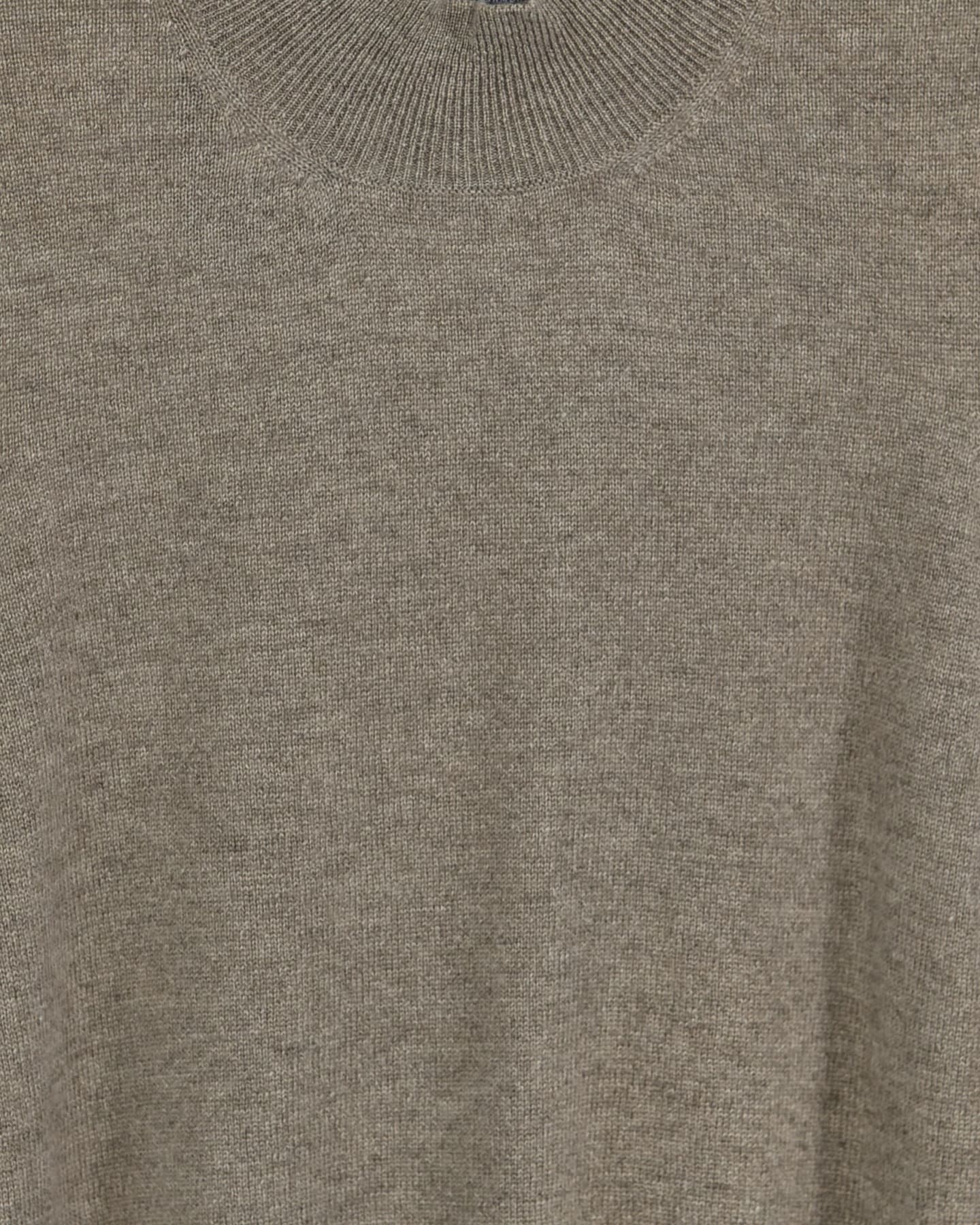 Close-up of soft cashmere t-shirt in natural brown