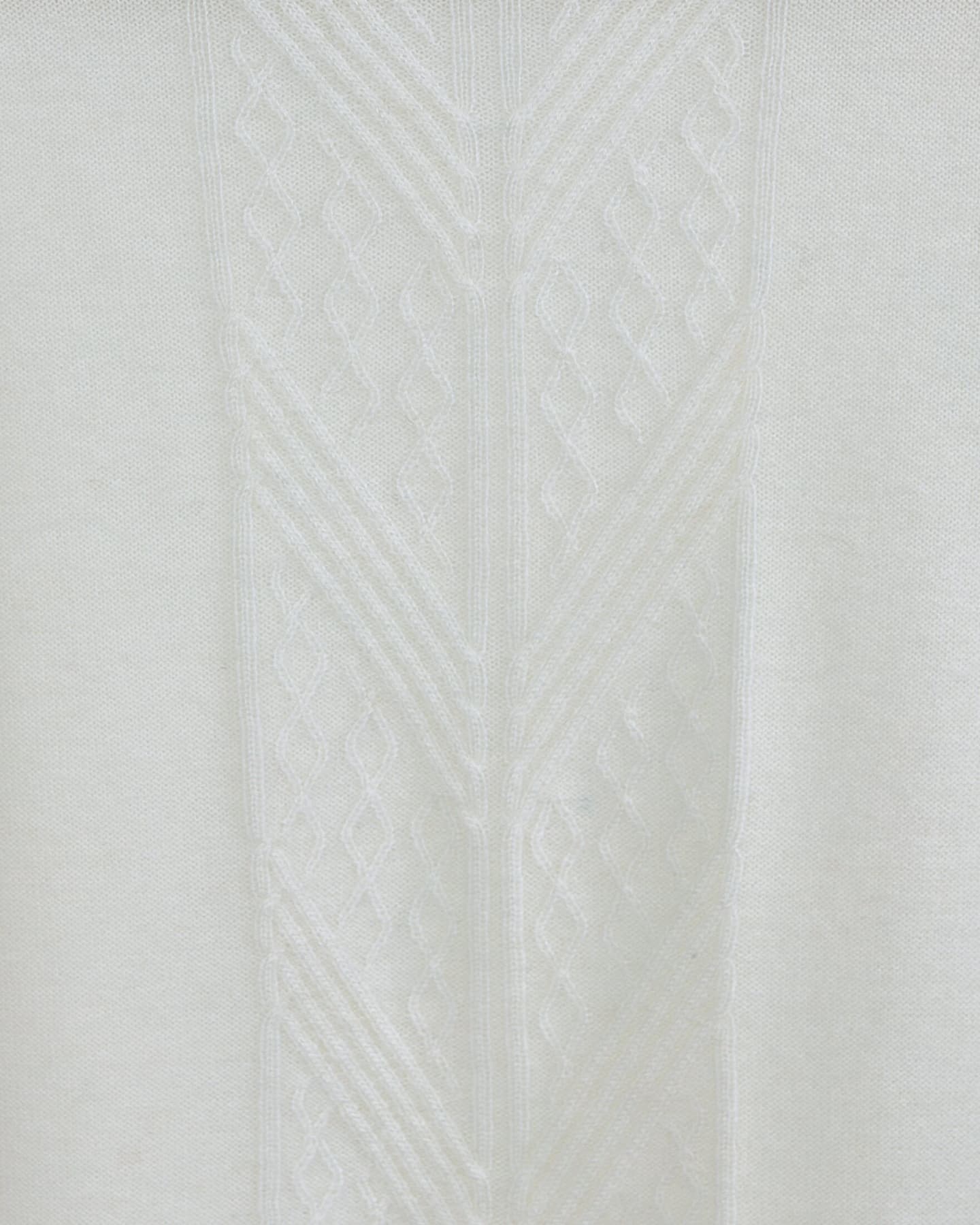 Close-up of soft cashmere jumper in white