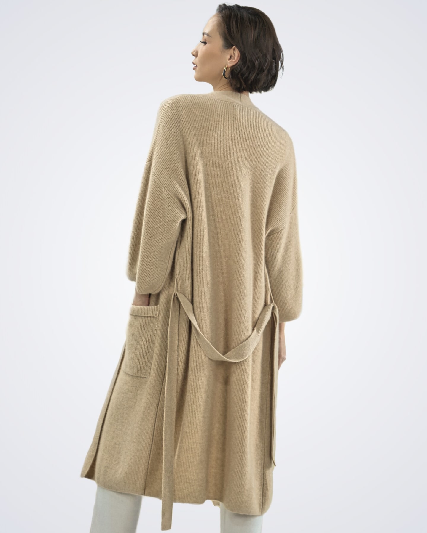 Back view of women's natural beige cashmere ribbed cardigan – Unur