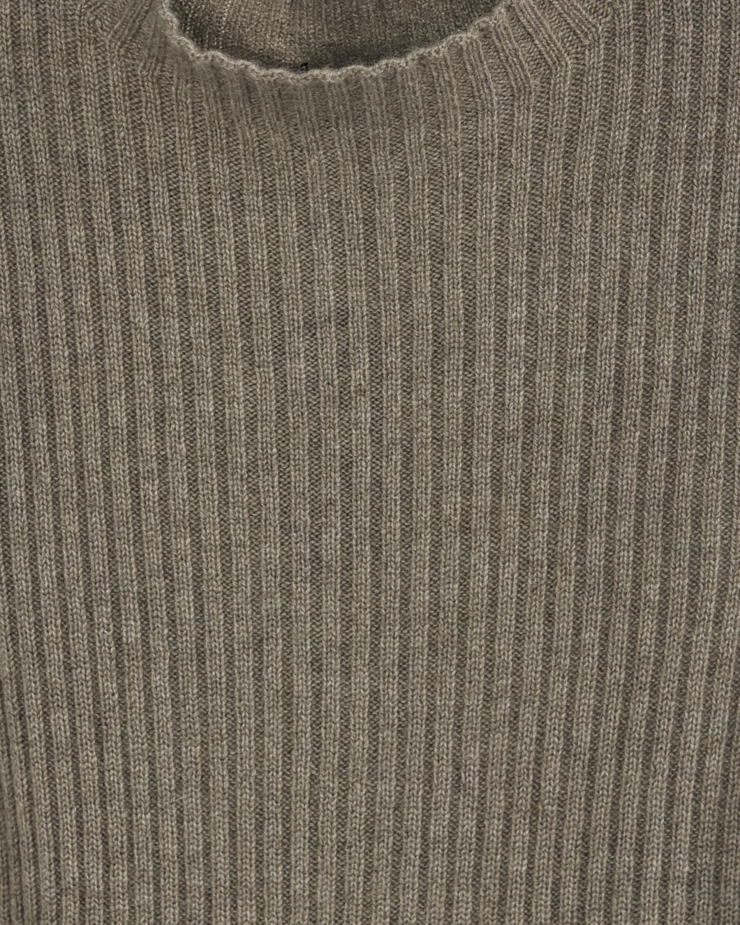 Close-up of soft cashmere ribbed in natural brown