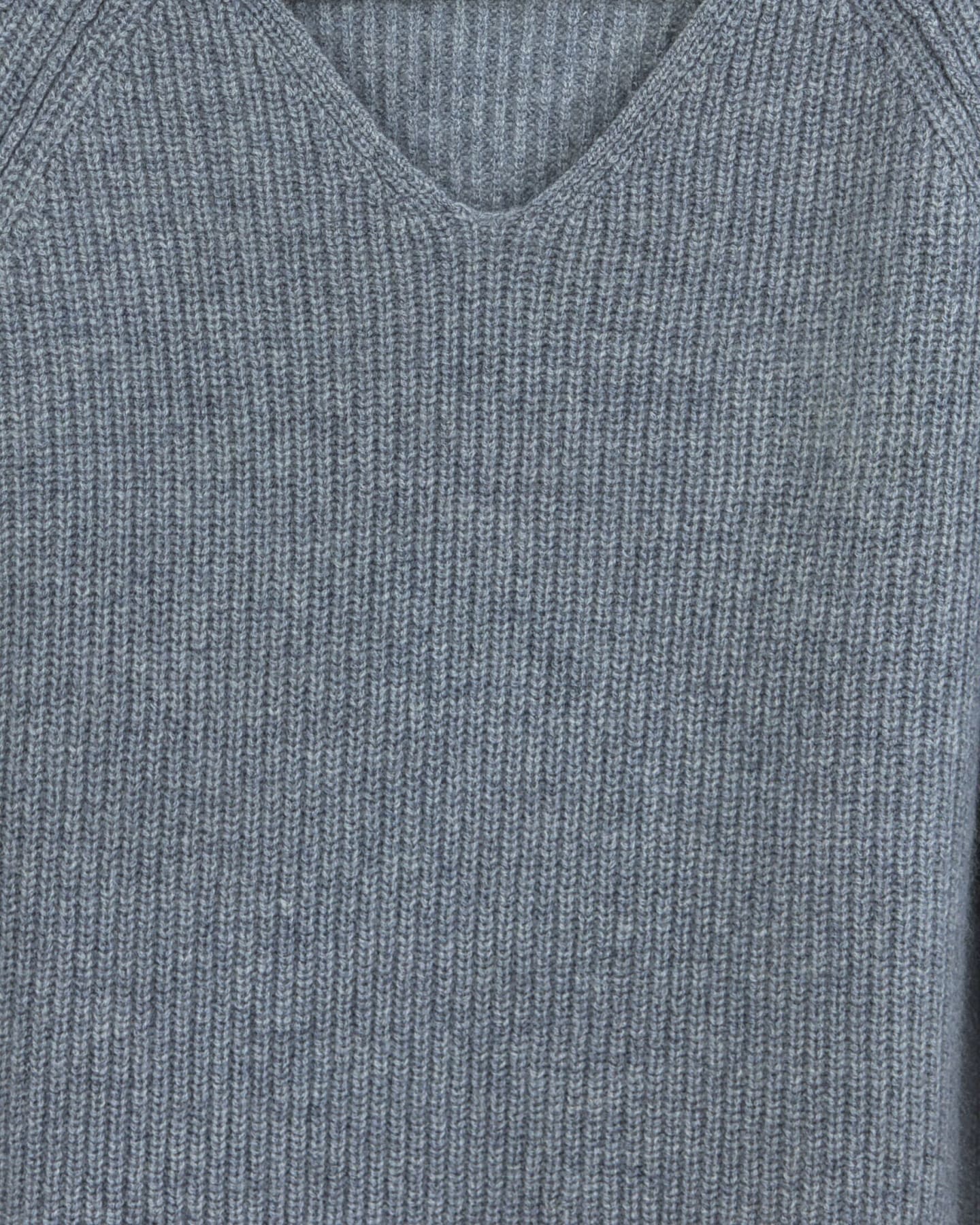Close-up of soft cashmere ribbed jumper in grey