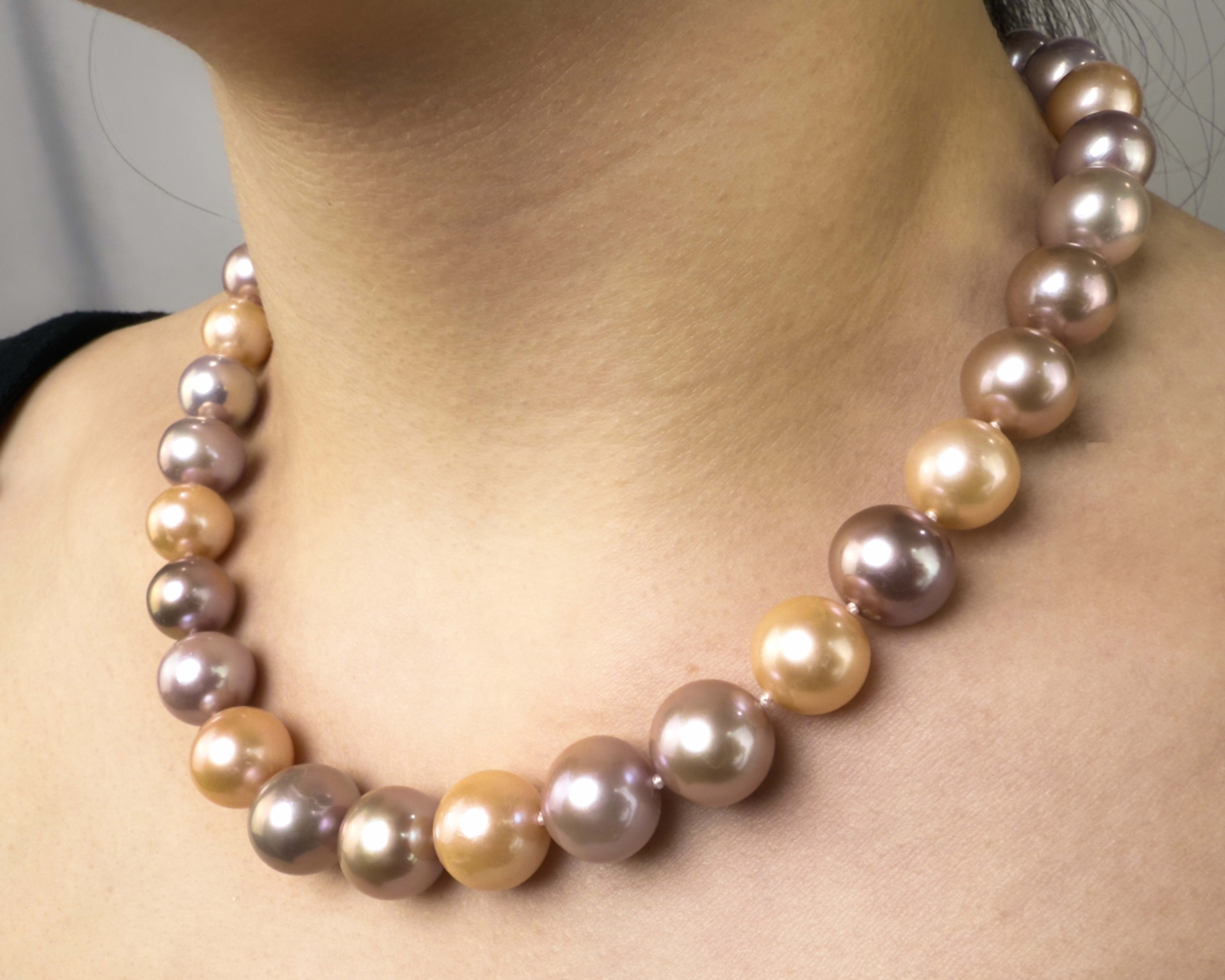 Model wearing classic necklace with peach and purple round pearls