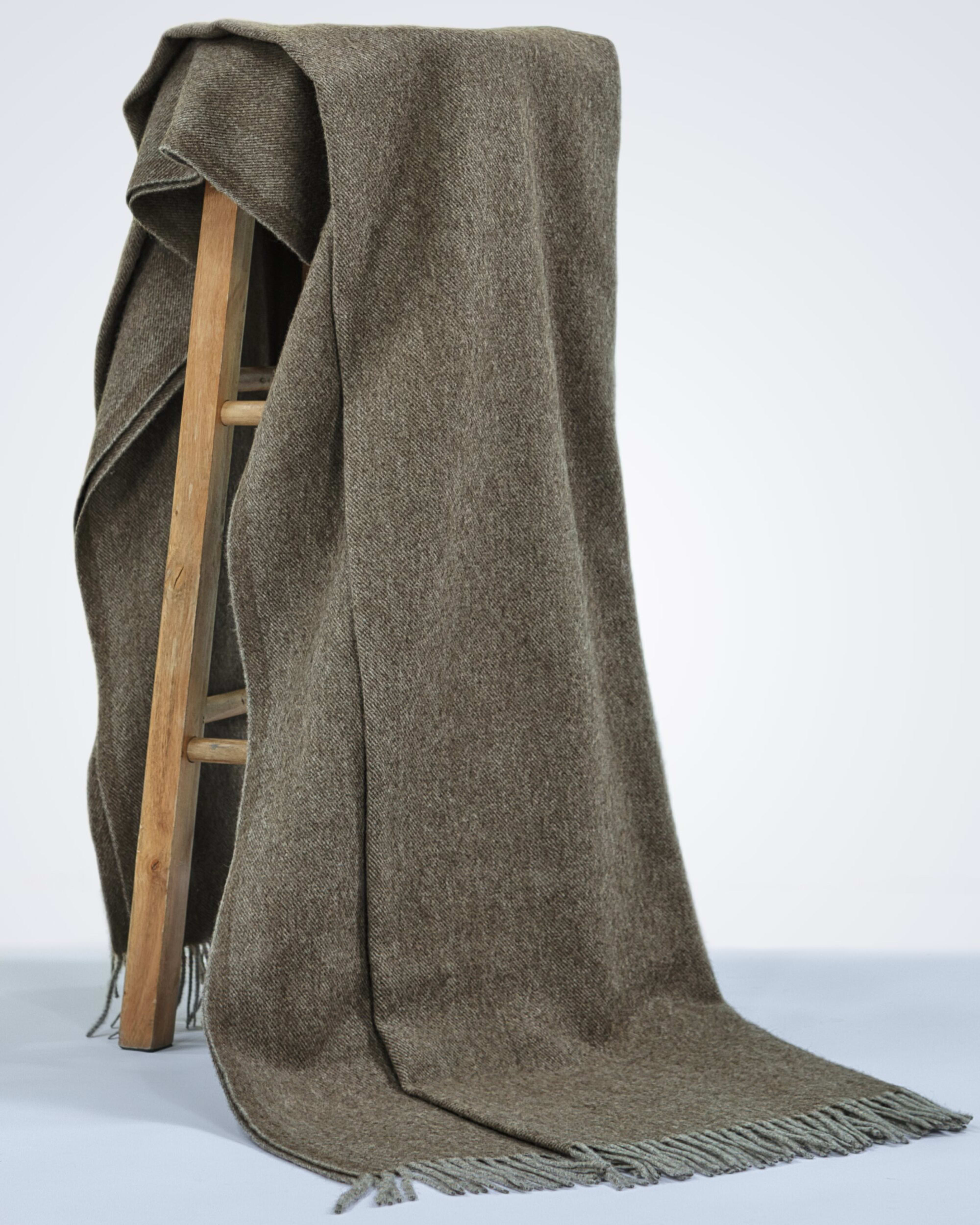 natural brown yak wool blanket draped over a chair