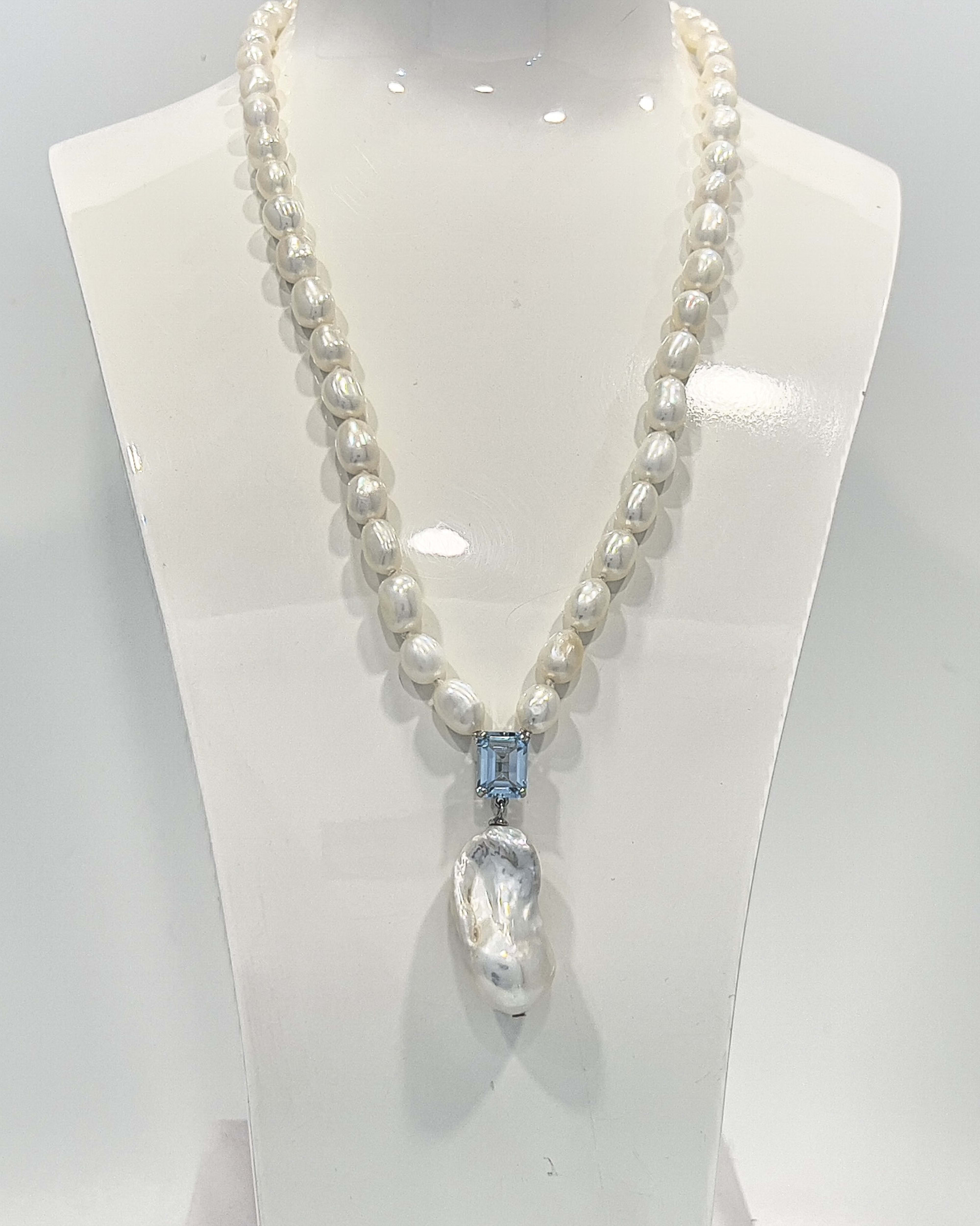 Signature baroque pearl pendant necklace with a square-cut topaz and delicate chain of smaller baroque pearls