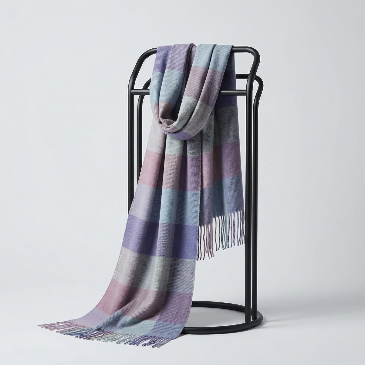Purple, blue and grey check Mongolian cashmere scarf with tassel fringe, draped on a black studio stand