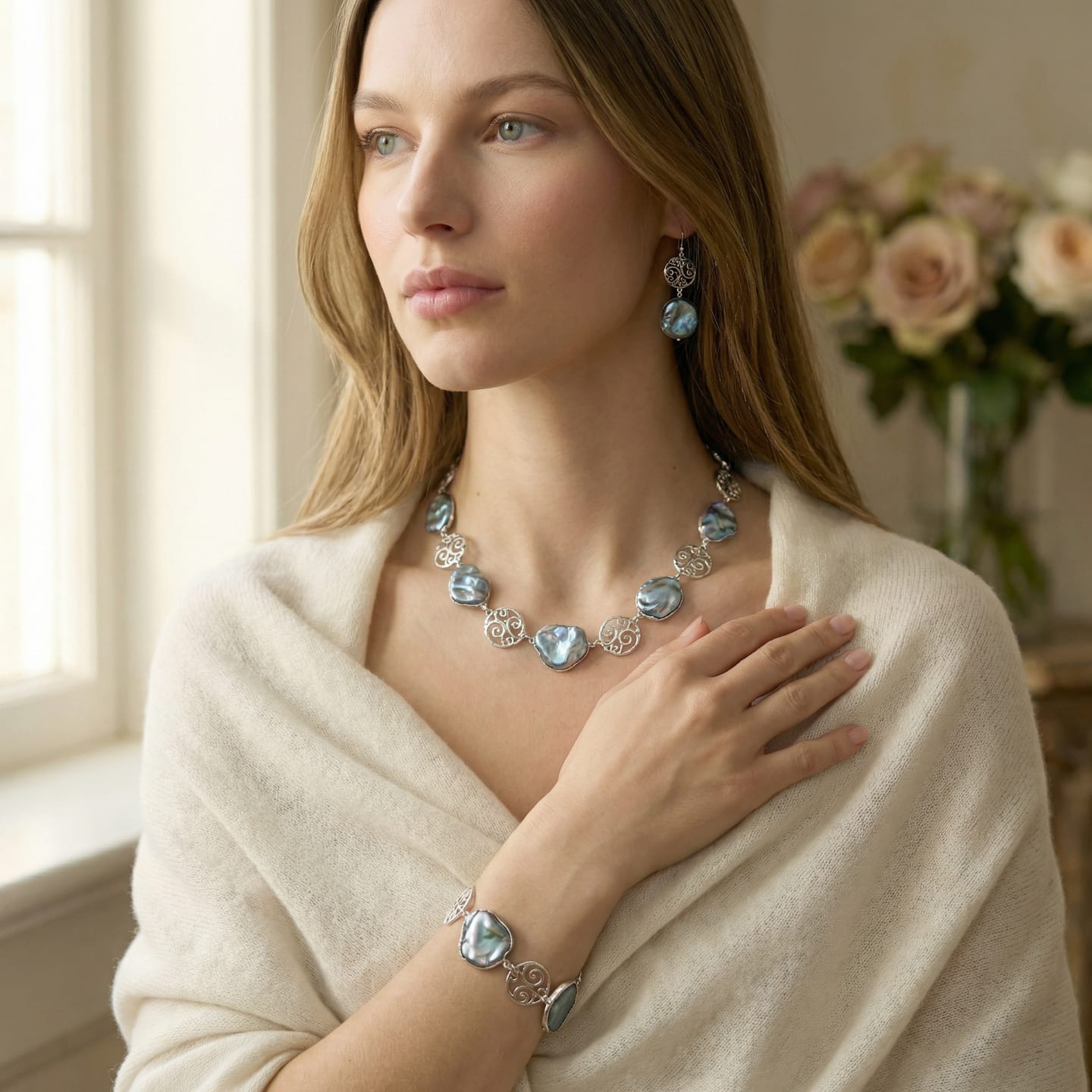Model wearing the Dark Keshi Pearl & Silver Filigree statement necklace at the collarbone.