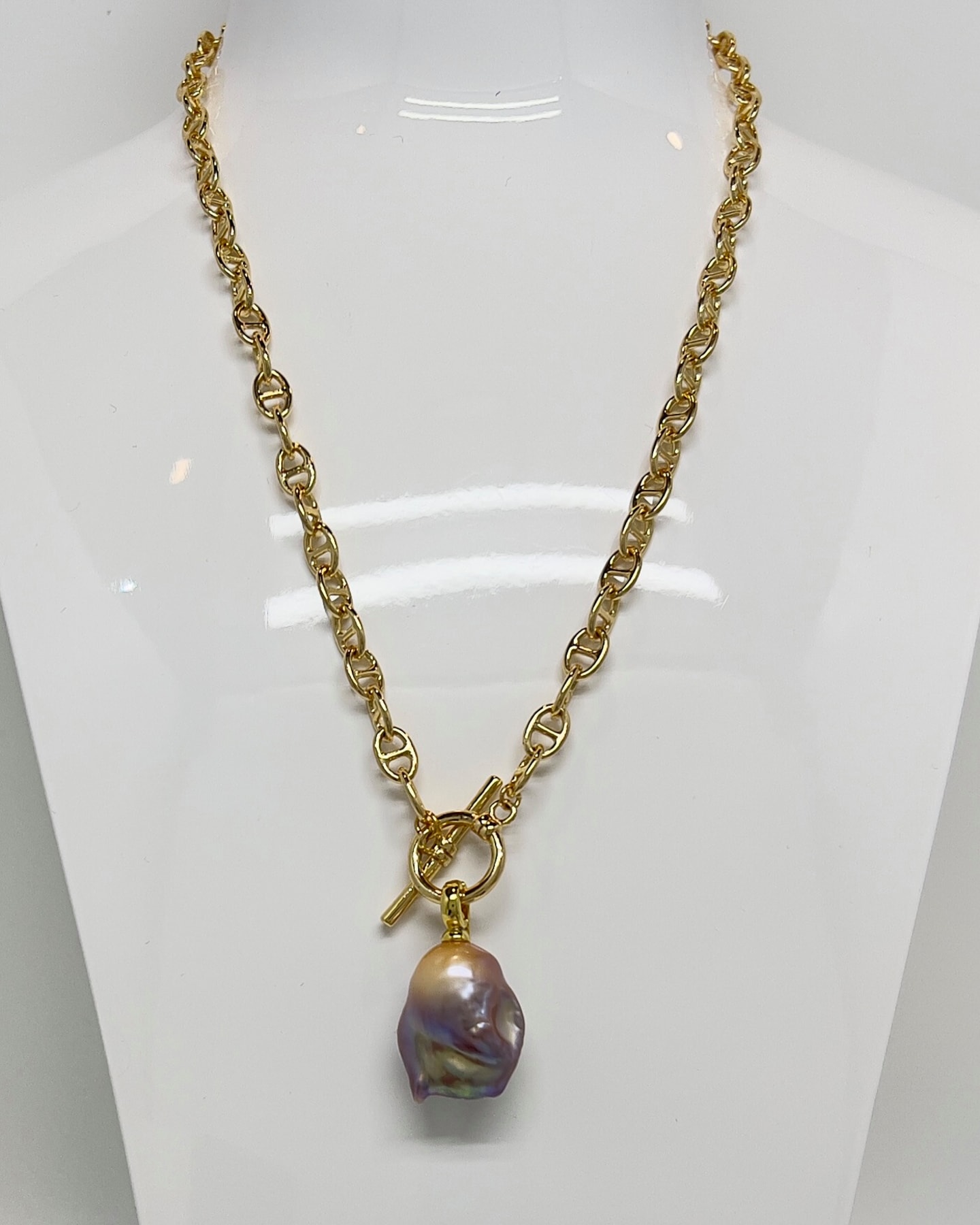Gold Baroque Pearl Toggle Pendant Necklace on a white bust display, anchor link chain with T-bar toggle and large baroque pearl drop.