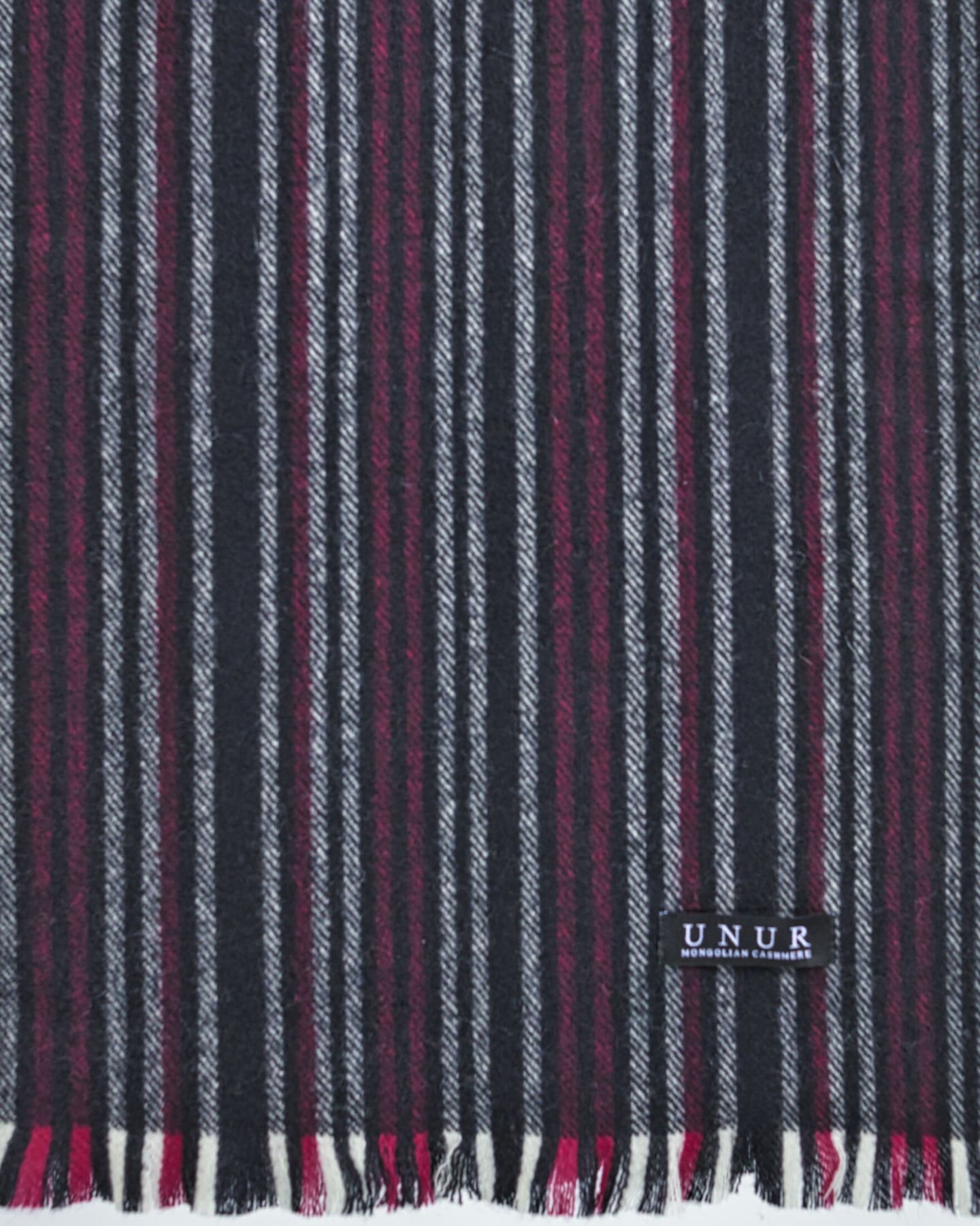 Close-up of men's soft cashmere pinstripe pattern scarf