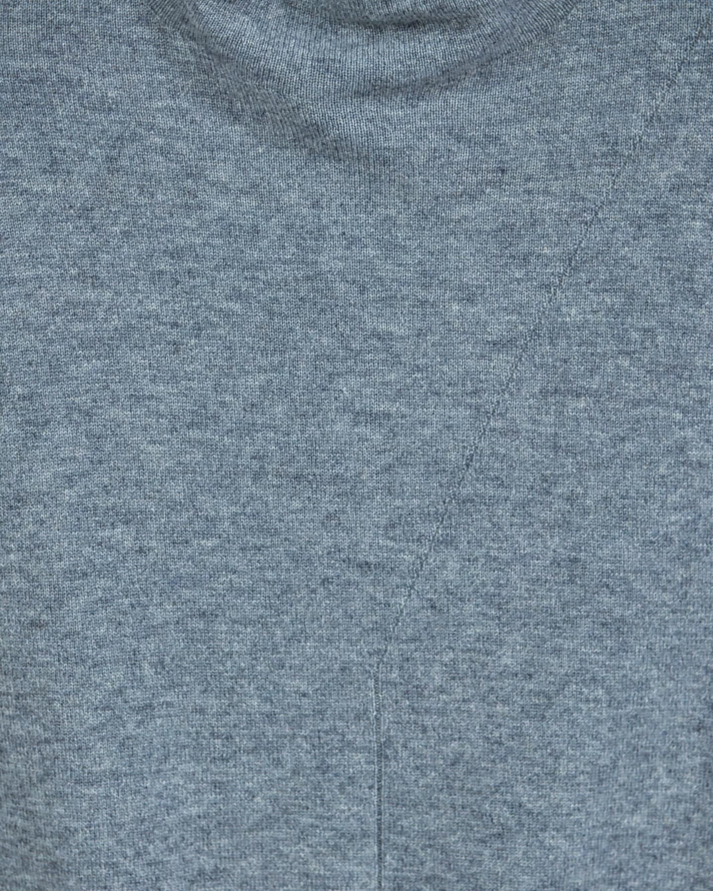 Close-up of the grey cashmere vest showing fine plain knit melange yarn and the diagonal front panel seam – Unur