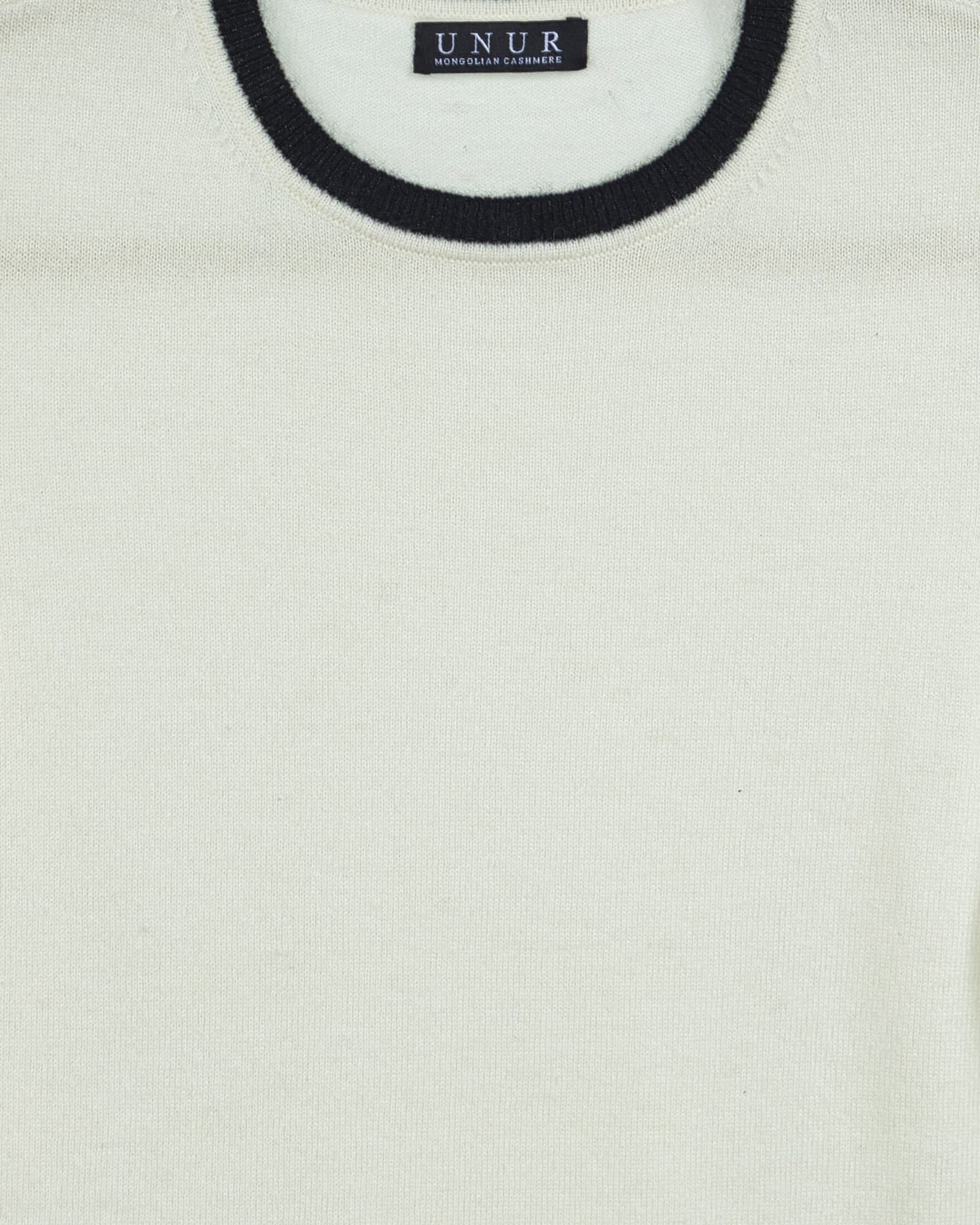 Close-up of soft cashmere t-shirt in white