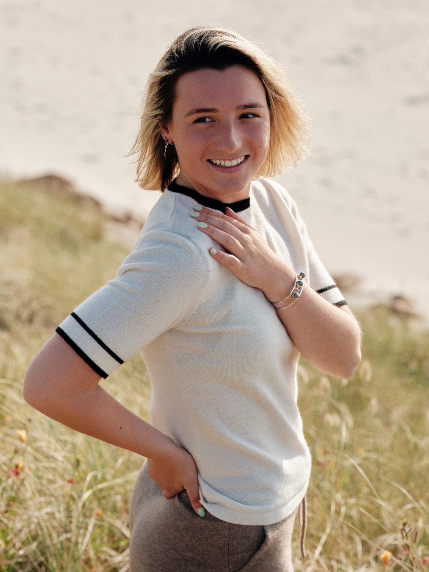Women's white cashmere crew-neck t-shirt on model