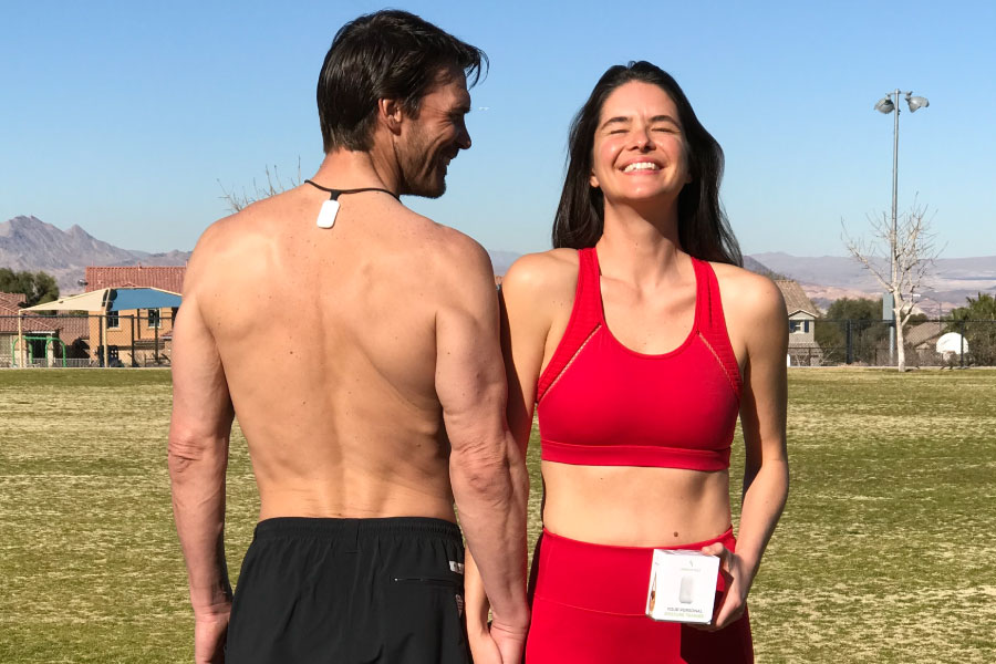 Couple displaying the body language of love by mirroring each other's posture