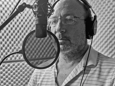 A deep dramatic authoritative male voice over